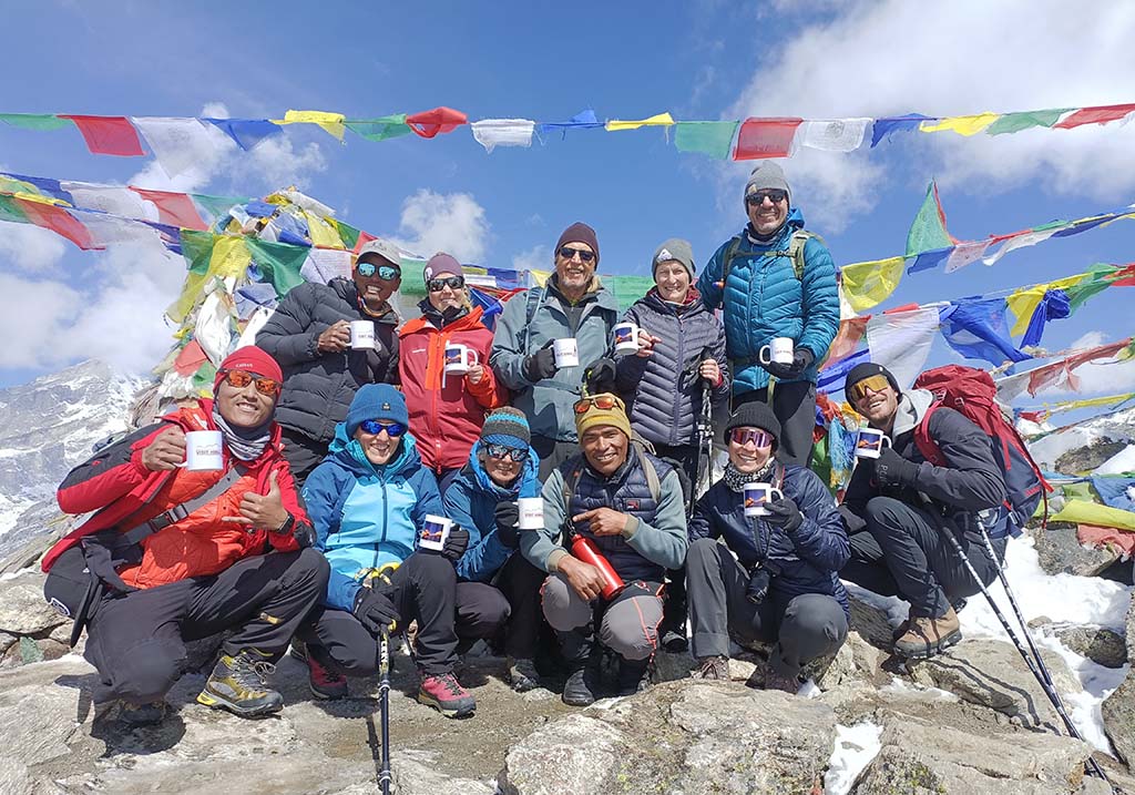 Group Photo with Buddhist Prayer Flags Background. 